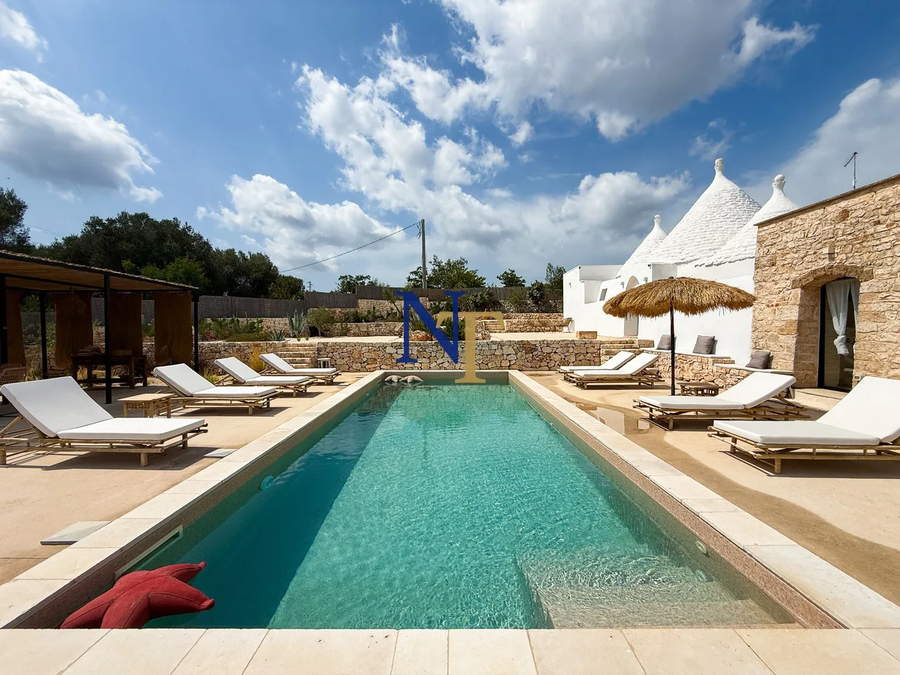 Trullo and Lamie with Private Pool and 7,102 sqm of Land for Sale near Ostuni